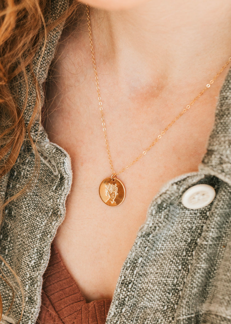 Gold Hello Adorn Mental Health necklace with circular pendant