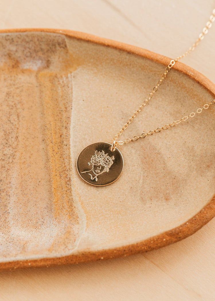 Gold Hello Adorn Mental Health necklace with circular pendant