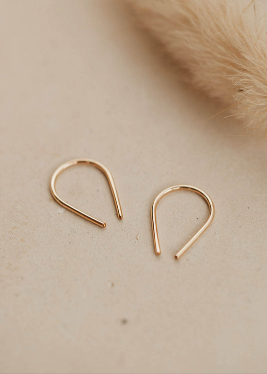 Tiny horseshoe gold threader earrings by Hello Adorn.