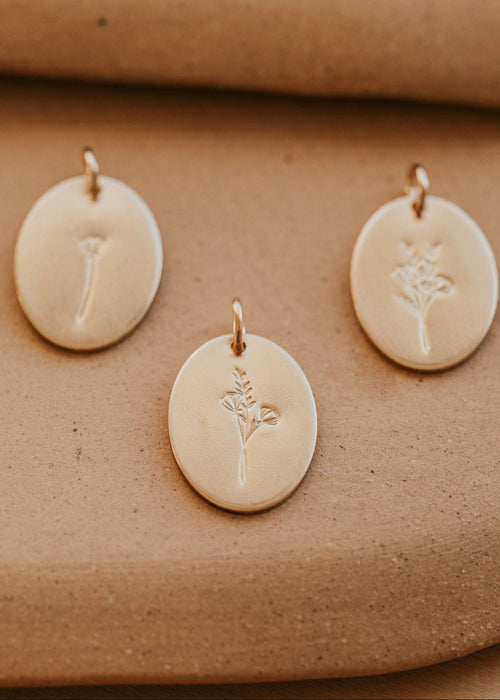 Raising Wildflowers Oval Pendant