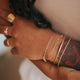 A cuff bracelet paired with two patchwork bracelets, this bracelet stack features mixed metal jewelry, patchwork bracelets are chain bracelets linked together to create a unique one-of-a-kind bracelet.