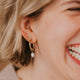 pearl dangle drop earrings on model