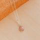 Sterling Silver Rosalie Necklace by Hello Adorn - oval pink stone pendant on silver chain against terracotta prop
