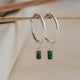 silver hoop earring with gemstones