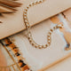 Dylan Bracelet laying on ceramic chain