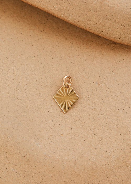 Sunburst Charm
