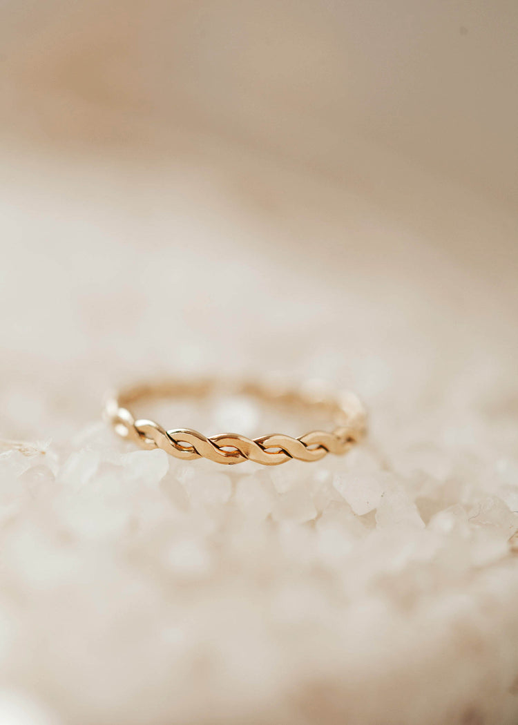 A braided ring created by Hello Adorn to wear as a stacking ring in your new ring stack.