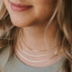 Layering gold chain necklace in Herra style by Hello Adorn shown in three different lengths.