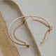 The Tides Cuff created by Hello Adorn, a cuff bracelet stacked to a chain bracelet to give a 2 in 1 bracelet look.