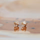 Handmade jewelry using herkimer diamonds shown in 14k gold fill to create diamond quartz stud earrings by Hello Adorn.