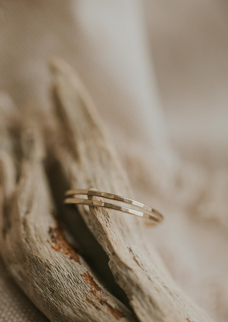 2 gold hammered thin rings used for creating a ring stack by Hello Adorn shown in 14k gold fill.