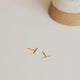 Bar stud earrings by Hello Adorn in 14k gold fill.