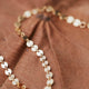 A 14kt Gold Fill chain bracelet with tiny small discs.