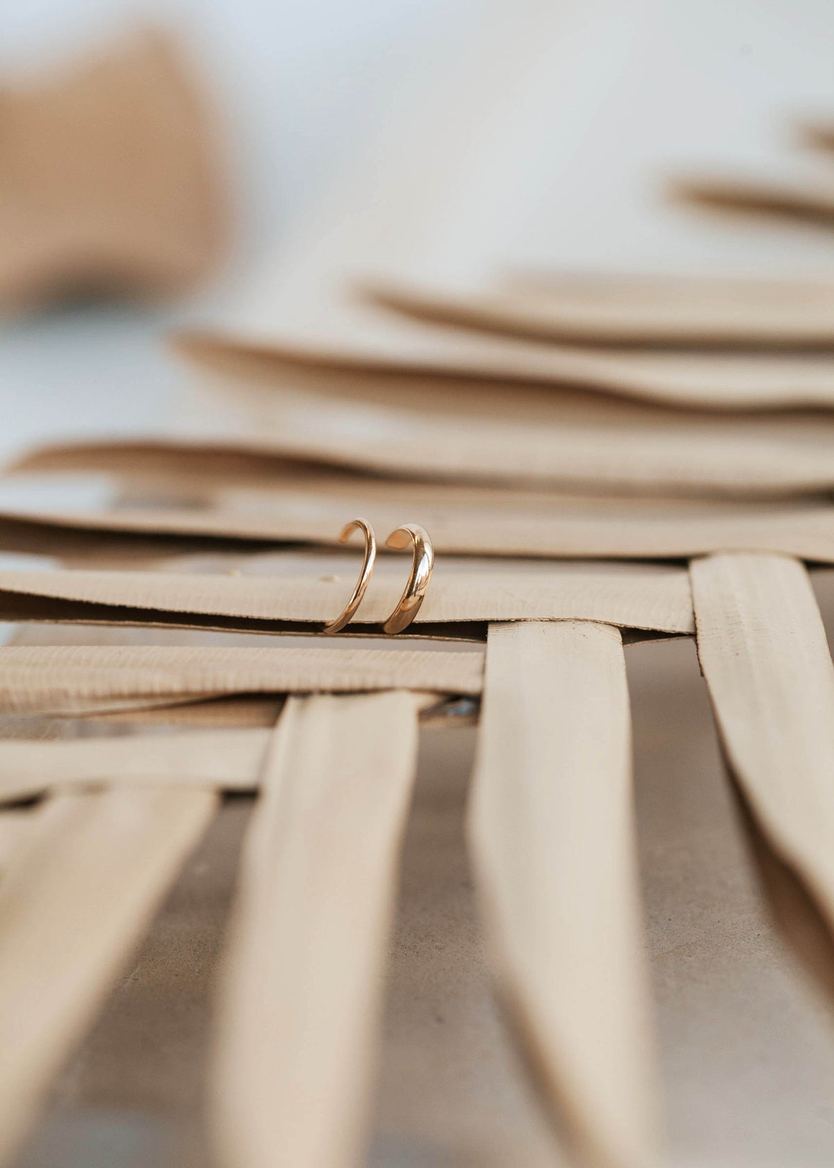 A close up look of the Ear Cuff Duo by Hello Adorn that has a thin ear cuff and a thick ear cuff for non pierced ears or earrings for no piercings.