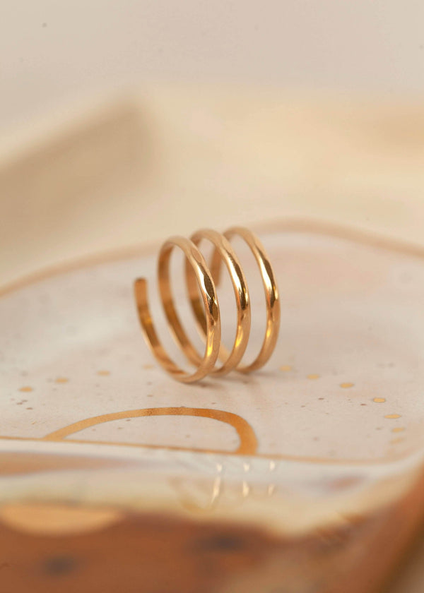 Thicker wire used to create a wrap ring by Hello Adorn, a perfect addition to stacking rings to complete your ring stack look.